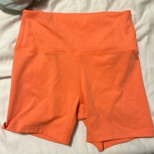 orange biker shorts